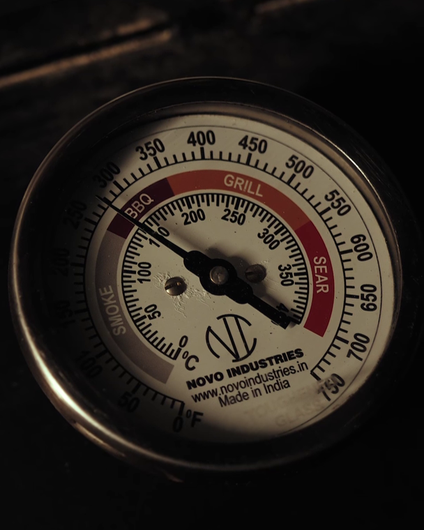 The thermometer on the Char & Co offset smoker